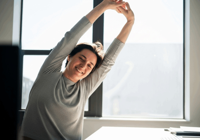 Performing 1‑minute movement breaks (standing, stretching) every 30 min leads to modest reductions in systolic blood pressure (~a few mmHg) and less fatigue.