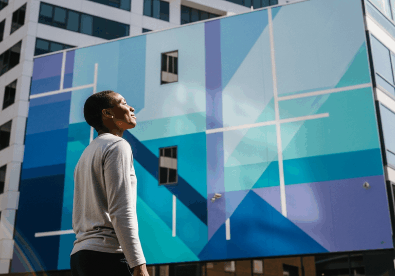 Viewing cool-themed room murals for 2 minutes can reduce heart rate significantly (~p < 0.05), fostering mood calm through visual color exposure.